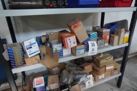 Contents on 1 shelf of various screws, bolts, nuts, etc.