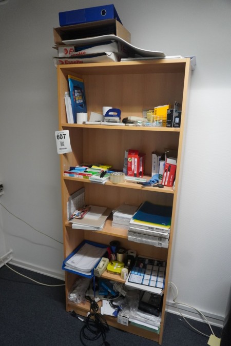 Bookcase containing various office items