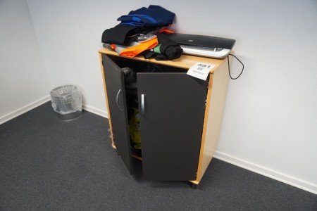 Cabinet containing various pre-printed workwear