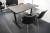 Electric raising / lowering table, Brand: Dencon + 4 chairs, Brand: Ventus Denmark, Model: Down black pu & polished steel frame