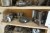 Contents on 4 shelves of various milling tools
