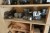 Contents on 4 shelves of various milling tools