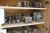 Contents on 3 shelves of various milling tools