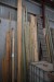Various boards, battens, etc. on back wall