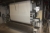 Silk Screen printing machine, Stork. Approx. 35-40 years old. SN: K600.0.00. Several retrofittings / improvements. Double width printing (2 meters). Capacity: 50 meter / minute. The machine has a Stork printing unit, 2 heating sections (Tresso), Inspectio