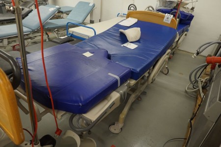 Hospital bed with braces for legs