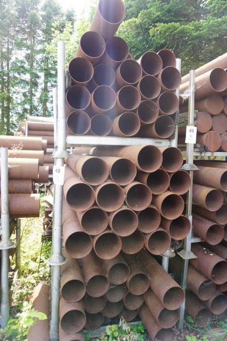 3 racks with various iron pipes