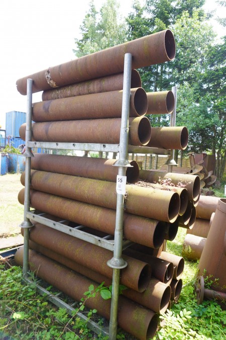 3 racks with various iron pipes