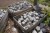 5 pallets with various granite cobblestones
