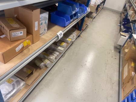 Contents on 2 shelves of various BMW spare parts