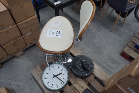 Chair, clock and robot vacuum cleaner