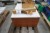 Wooden cabinet with various antique hand tools