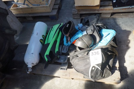 Pallet with various diving/motocross equipment