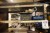 Workshop shelf with contents of various special tools, plus assortment shelf with light bulbs