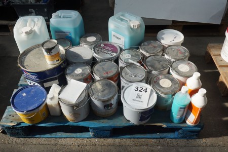 Various buckets of wood paint, primers, wallpaper softener, etc.
