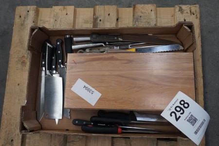 Box with various knives & cutting board