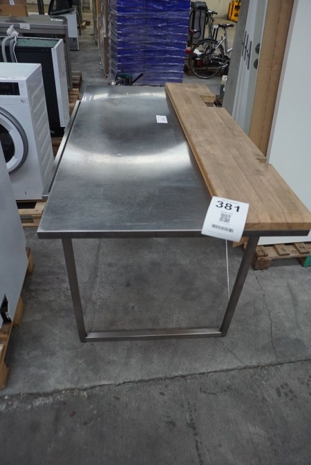 Stainless work table with cutting board