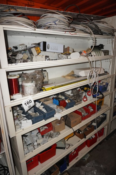 8 cupboards containing various electrical components, plugs, fuse boxes, converters, etc.