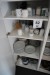 4 shelves with cups & plates etc