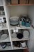 4 shelves with plates, cutlery etc
