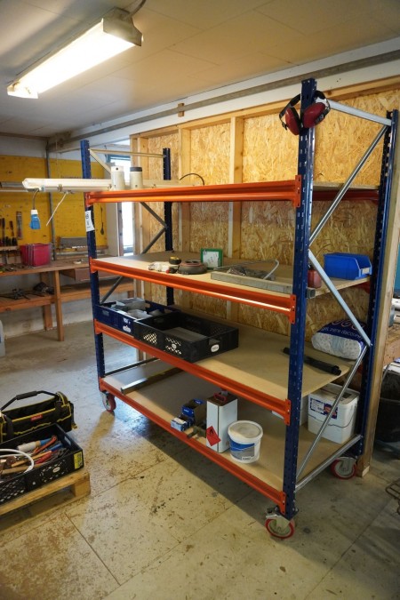 Pallet rack on wheels with contents