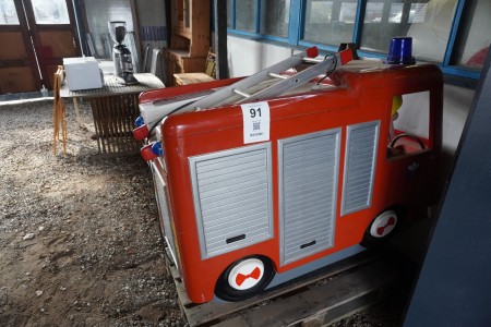 Fire engine with coin insert
