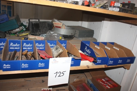 Shelf with various drills, etc. in 12 boxes