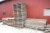 Lot pallets + miscellaneous along the wall