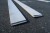 129.6 meters of rough white-painted boards