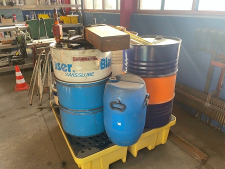 Coolant / Cutting fluid 3 drums with collection tank.