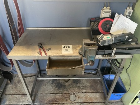 Work table including: vise