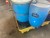 Coolant / Cutting fluid 3 drums with collection tank.