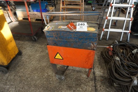 Tool box on wheels containing various tools