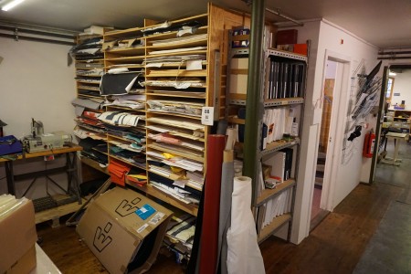 Bookcase with contents of various clippings