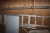3 x alu-skydestige på væg + alustige under loft + trillebør