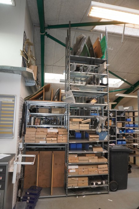 2 compartment storage rack containing various spare parts