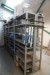 4 compartment storage rack containing various spare parts