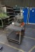 Hydraulic press mounted on table