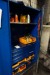 Tool cabinet containing various lubricants, gaskets, etc.