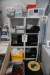 Contents of shelf + cabinet of various syringes, gloves, epoxy, etc.