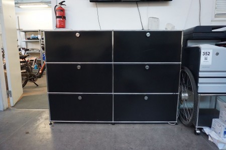 Double cabinet containing various spare parts for electric bicycles