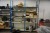 2-bay workshop shelf containing various spare parts for electric bicycles