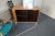 4 pcs. Steel shelving with contents, chest of drawers and chair