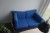 Sofa group with coffee table, lamp, plant and picture