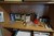 Bookcase containing various office supplies