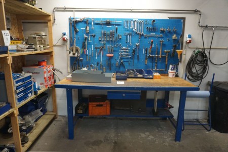 Workshop table with tool board