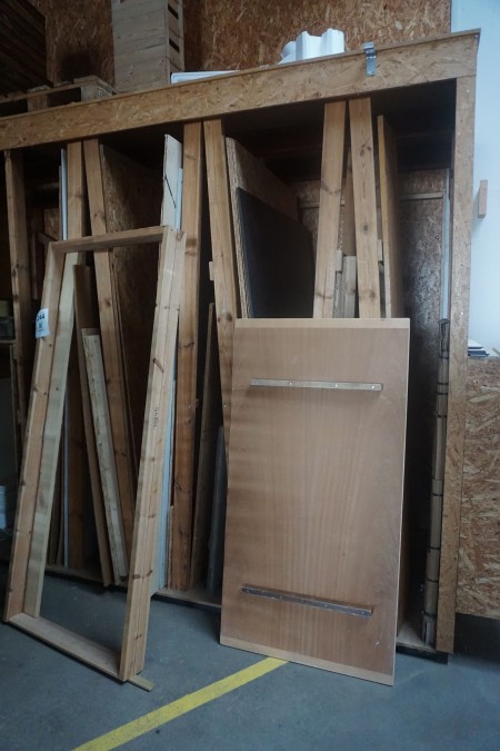 Contents in shelving of various wooden boards, planks, posts, off-cuts, etc.