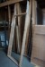 Contents in shelving of various wooden boards, planks, posts, off-cuts, etc.