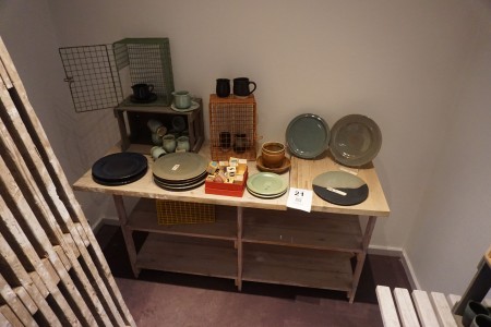 Bookcase containing various ceramics