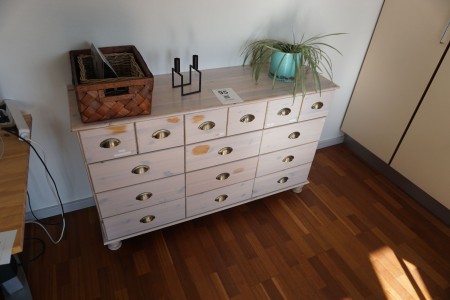 Chest of drawers with contents